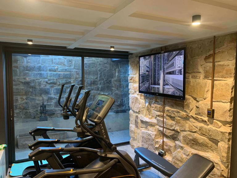 Home Gym with surround sound audio and video